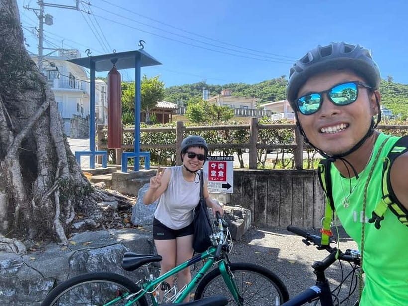 Okinawa: Henza and Hamahiga Islands Guided Bike Tour - Crossing to Hamahiga Island: Crystal-clear Waters and Sacred Grounds