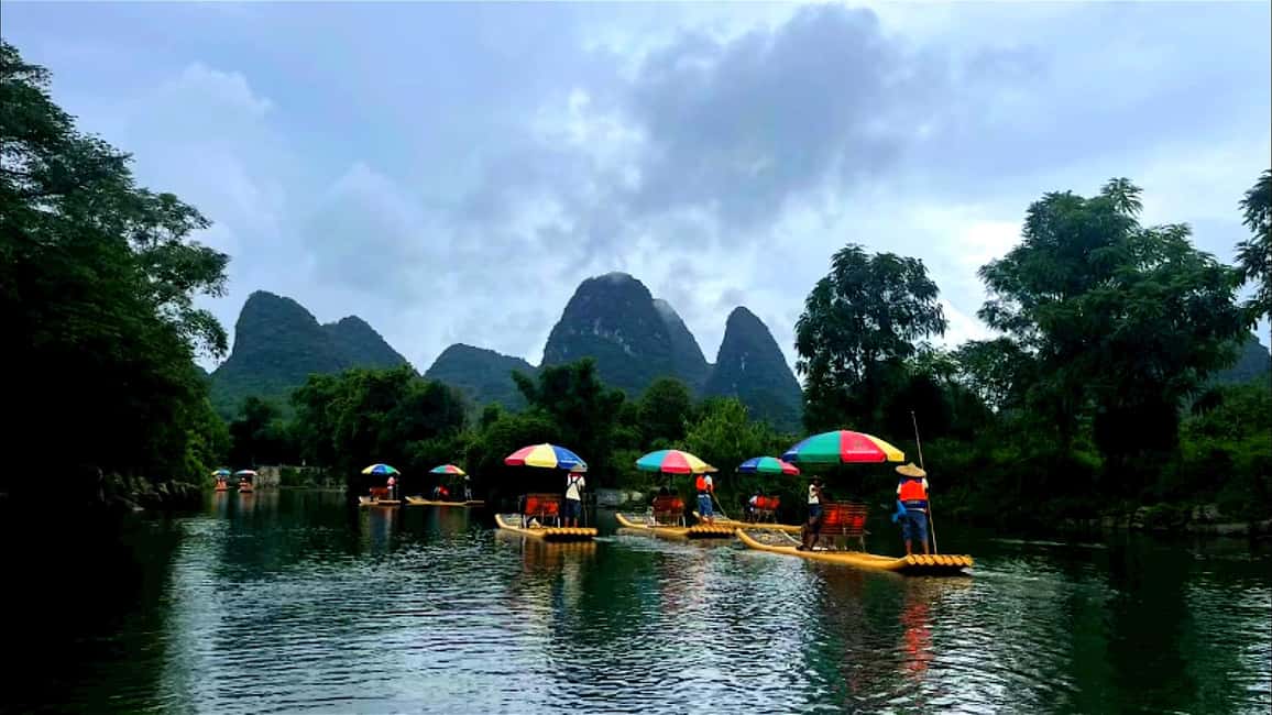 From Yangshuo: Yulong River bamboo raft Ruyi Peak Day Tour - Key Points