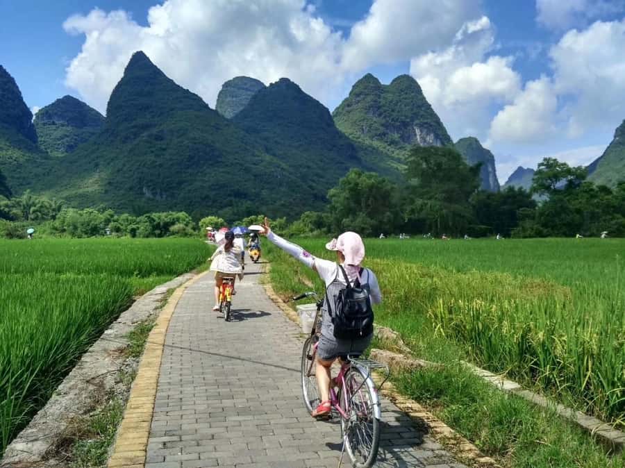 Yangdi Bamboo Rafting, Ancient Stone City& Show Tour - Cycling Yulong River and Enjoying Local Life