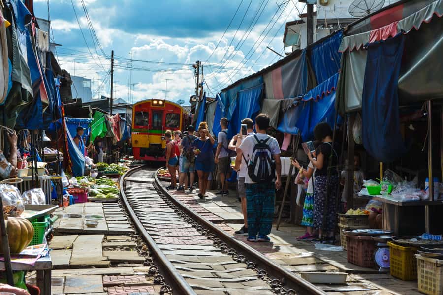 Bangkok: Maeklong Train Market & Floating Market Day Tour - Transportation and Group Size