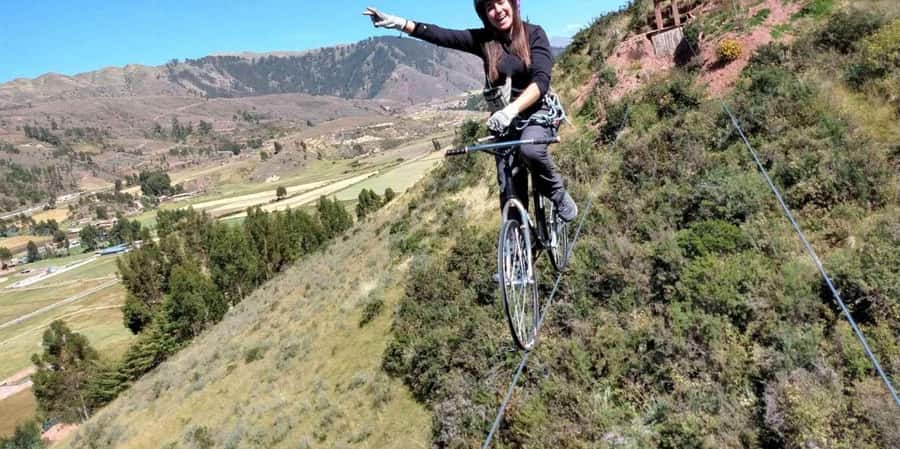 Cusco: Cachimayo Adventure Tour with Skybike and Via Ferrata - Key Points