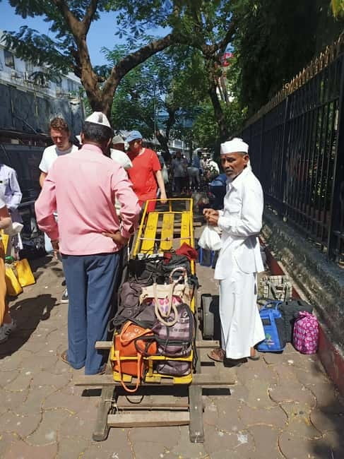 Meet Dabbawalas Visit Dhobi Ghat and Slum with Train Ride - Key Points