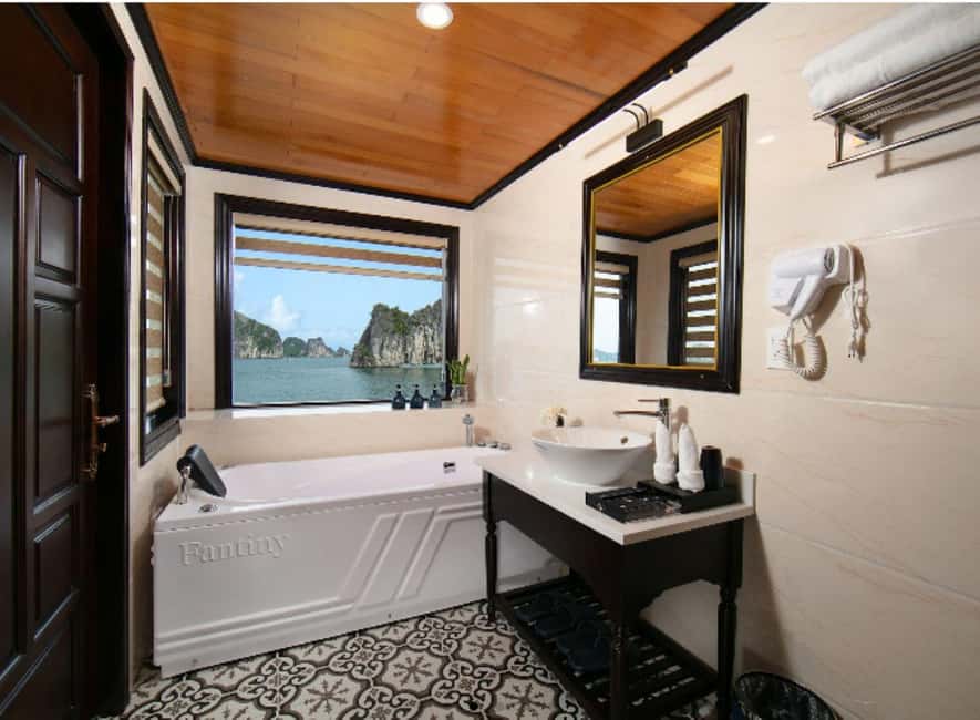 Heritage Cruise 2-Day l Ha Long Bay & Lan Ha Bay UNESCO Tour - Day 2: Exploring Dark & Light Cave and Return to Hanoi