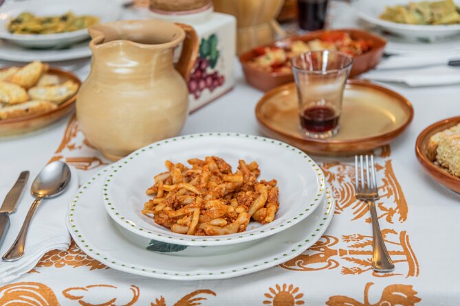 Lucca Walking Tour & Traditional Cooking Class with Wine - The Cooking Experience: Authentic and Personal