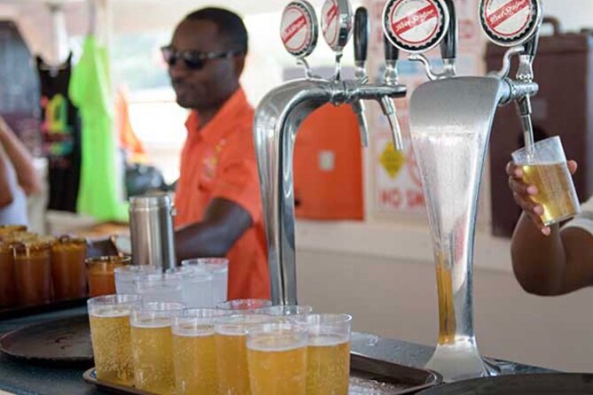 Exotic Catamaran Party Cruise and Snorkeling to Dunns River Falls - Key Points