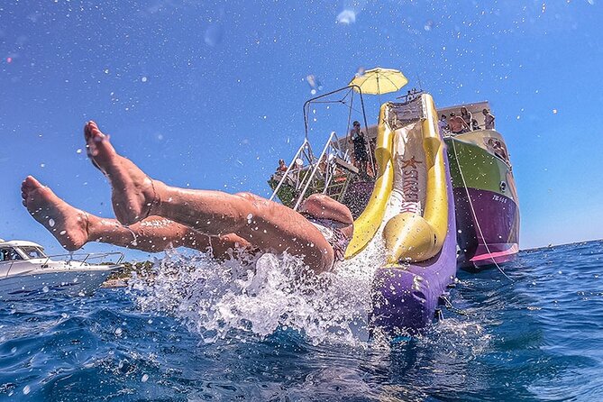 Phi Phi Maiton Sunset Tour by Speed Catamaran with Water Slide - What Makes This Tour Stand Out?