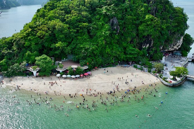 Halong Bay Cruise and Kayaking with Lunch and Music from Hanoi - Boarding the Iris Luxury Cruise: Comfort Meets Elegance