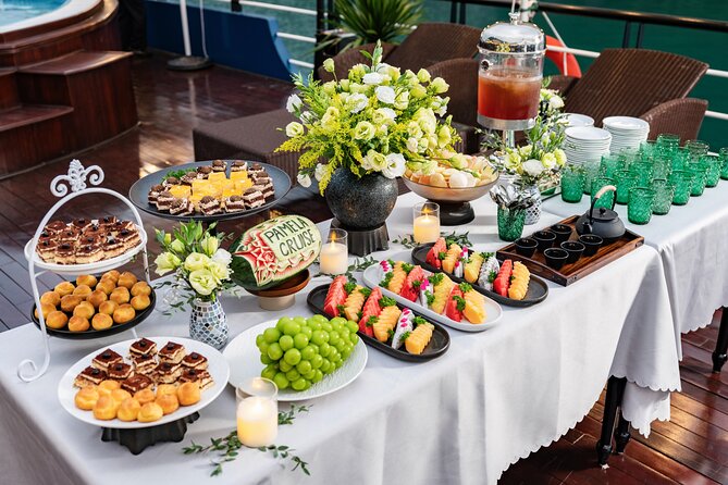 Pamela 5-Star Day Cruise: Explore Halongs Wonders - Afternoon: Titov Island and Relaxation