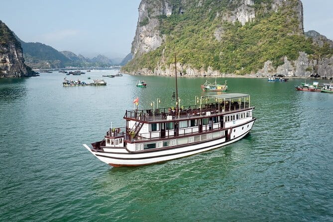 Garden Bay Cruises - Traditional Wooden Boat to Bai Tu Long Bay - The First Day: Cruising Bai Tu Long Bay