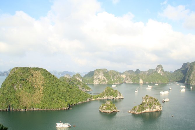 Halong bay full day trip: Visit Surprise cave, Titop island, kayaking & swimming - Key Points