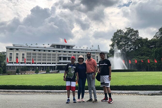 Experience Half-day Guided Walking Tour Ho Chi Minh City Center - Transportation, Timing, and Group Dynamics