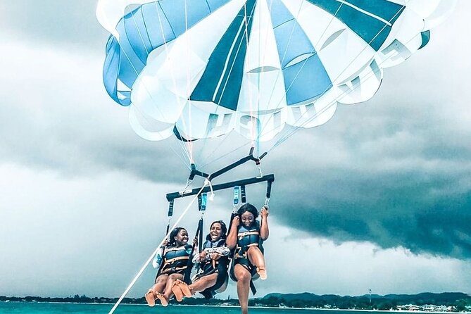 Parasailing, Blue Hole Mineral Spring, Seven Mile Beach - Who Should Consider This Tour?
