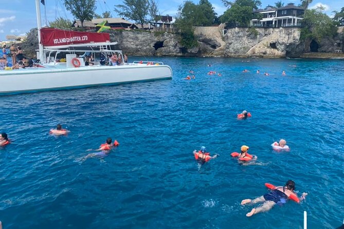 Catamaran Cruise and Bamboo Rafting Limestone Massage Experence - Authenticity and Value