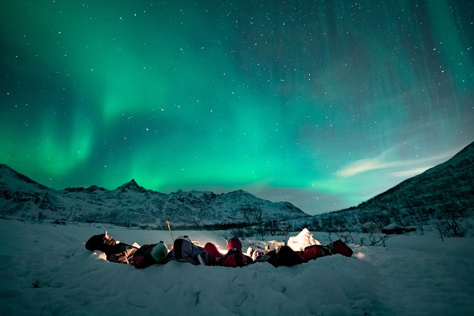Tromso Aurora Hunt with Bonfire, Soup, Winter Gear & Transfers - The Guides Make or Break It