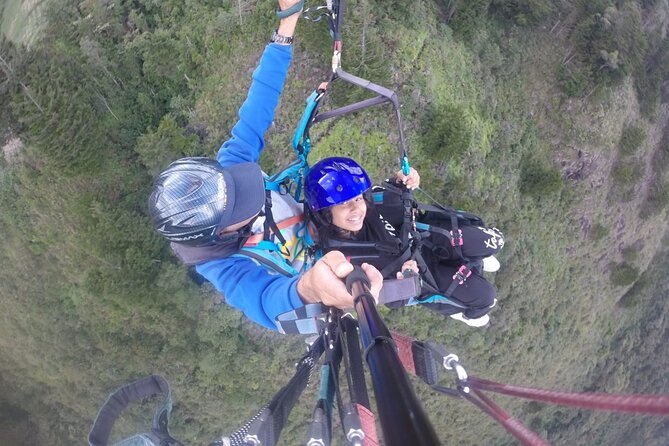 Go Paragliding in Medellín with private transporter service - Landing and Post-Flight