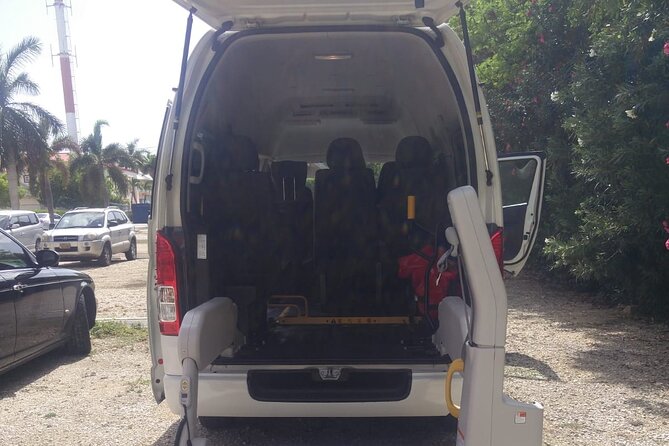 Airport Transfer to West Bay Accommodations (GCM)-Round Trip - Key Points