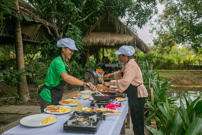 Angkor Sunrise Bike Tour with Breakfast and Lunch Included - Key Points