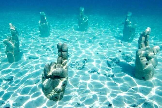 Isla Mujeres on luxury catamaran with snorkel, open bar and lunch - FAQ