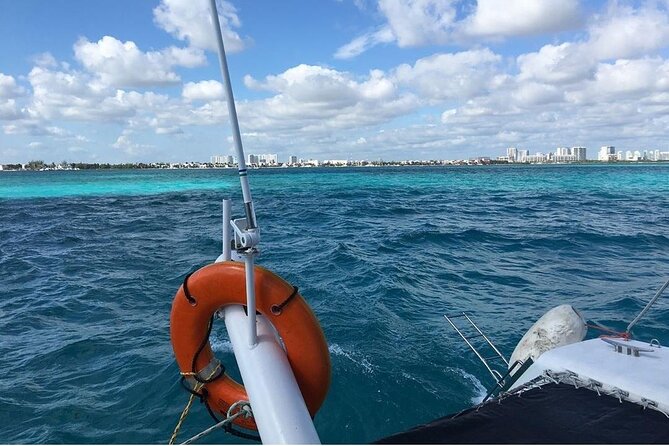 Catamaran to Isla Mujeres, Open bar, buffet, Beach Club Included - Frequently Asked Questions