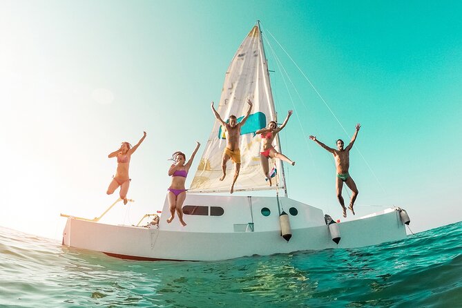 Catamaran to Isla Mujeres Snorkeling, Beach Club and Lunch Tour - A Complete Guide to the Catamaran to Isla Mujeres Snorkeling, Beach Club and Lunch Tour