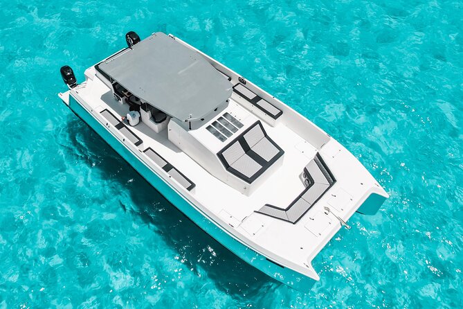 Private Atomic Catamaran Tour to Isla Mujeres - Detailed Breakdown of the Itinerary and What to Expect