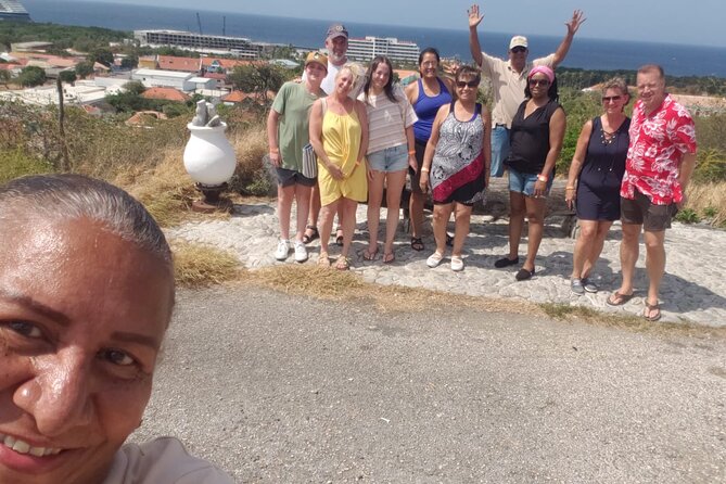 Shop and Beach Guided Tour in Curacao City - Relaxing at Mambo Beach: Sun, Sand, and Socializing