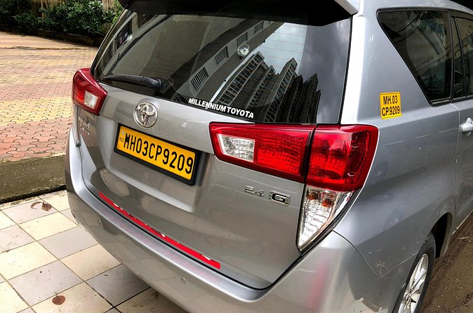 Mumbai Airport Drop via Toyota Crysta SUV - The Sum Up